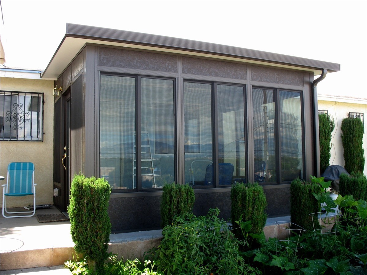 exterior of home with large rectangular windows