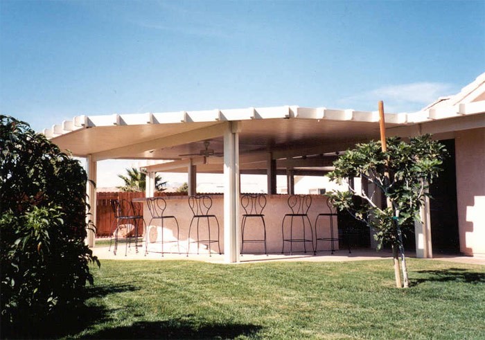 exterior of home with custom patio cover