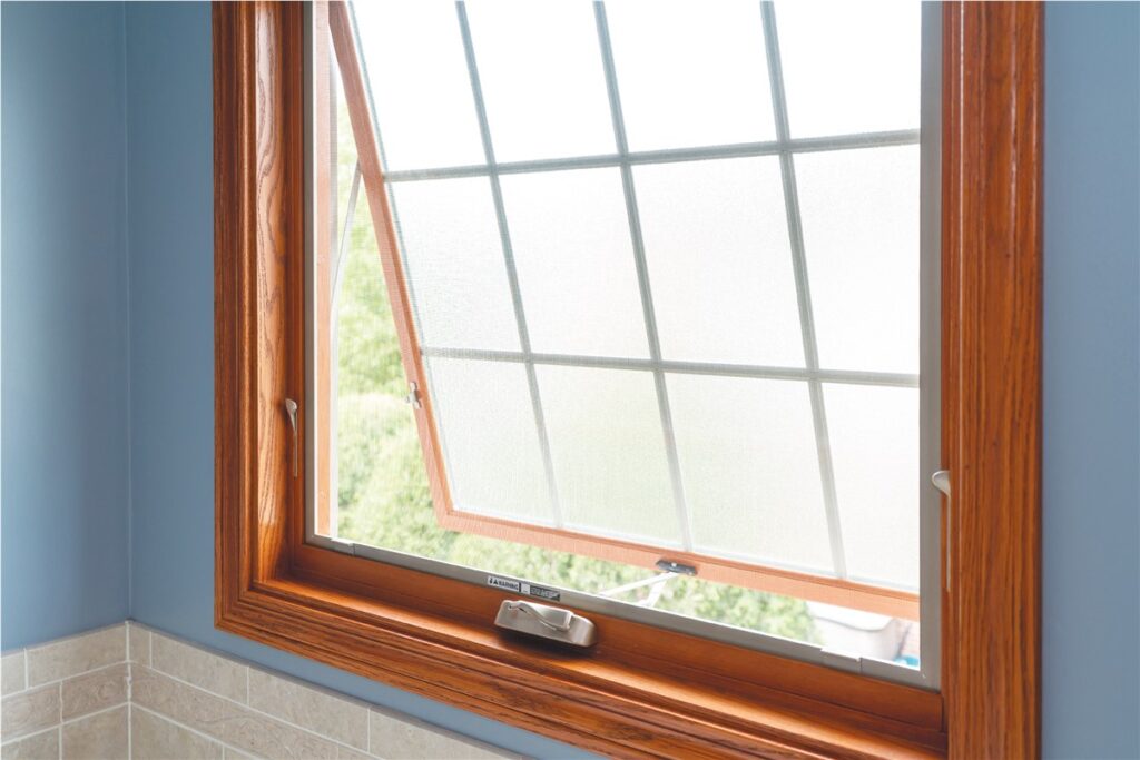 awning window being opened from the inside