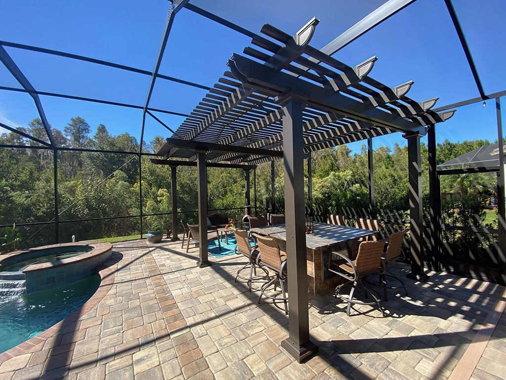 Pool Enclosure attached to a home patio