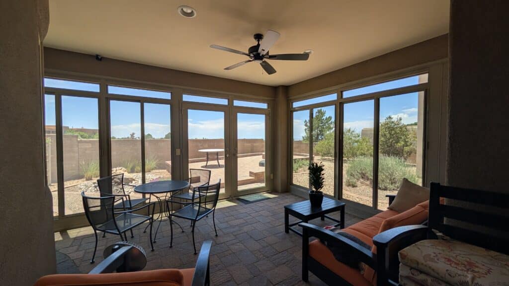 All-season Room exterior with wall-to-wall windows