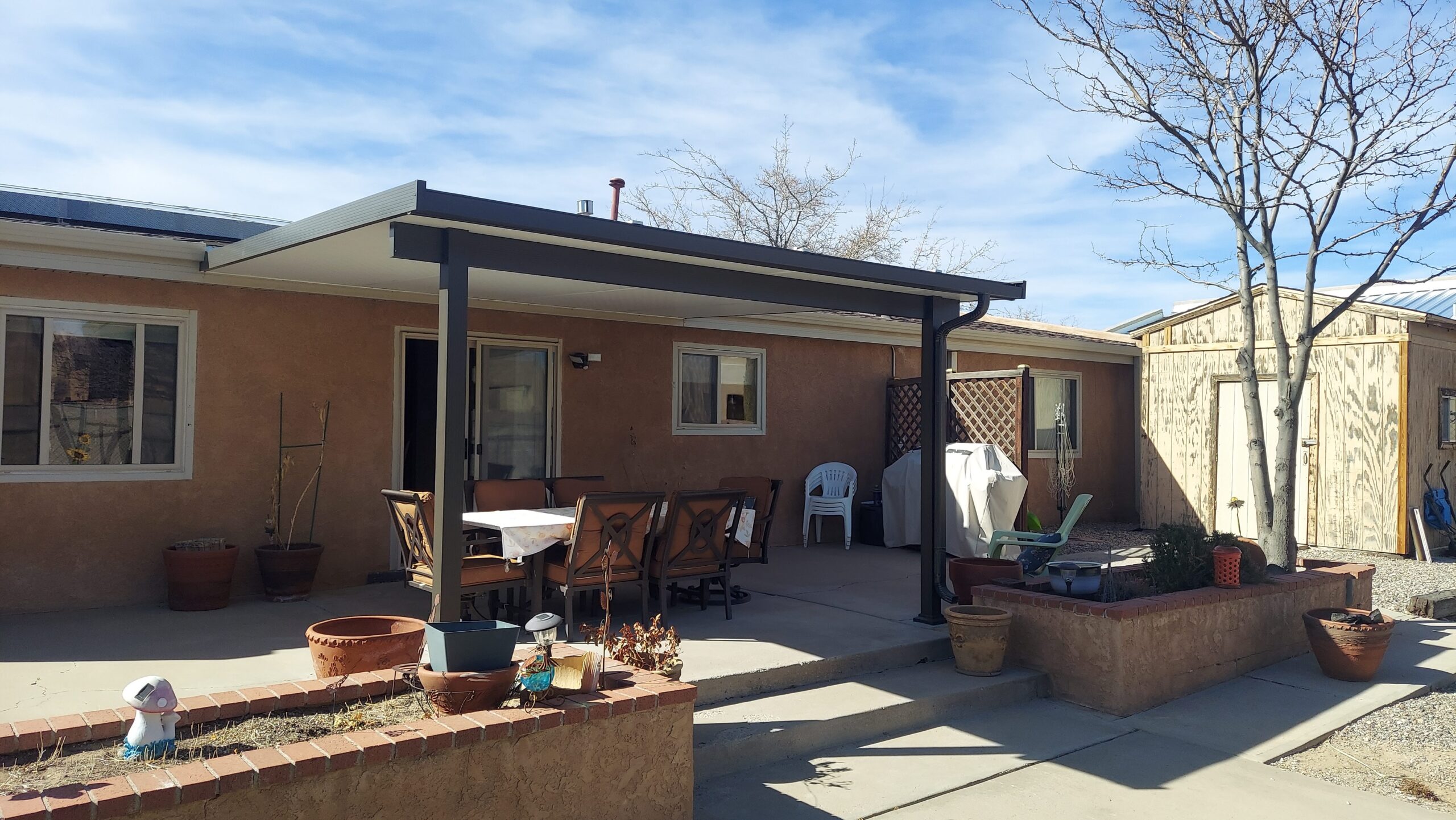 Full shade patio cover with outdoor seating