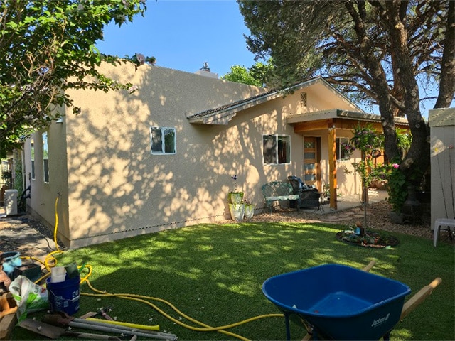 Completed detached backyard ADU with stucco exterior